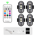 Kit contents: four RGB LED pucks, wireless remote, USB charging cable and adhesive pads