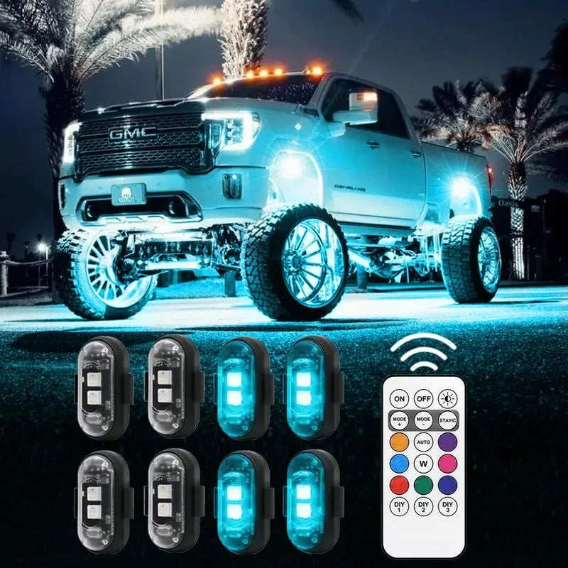 Pickup truck with cyan LED accent lighting, shown with RGB light pucks and wireless remote